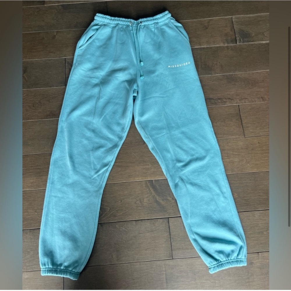 Women sweat pants color light green size US 4 brand missguided